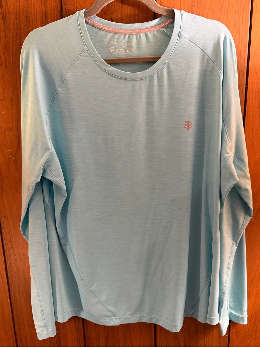 Coolibar Women's Long Sleeve Sun Shirt in Pale Blue with Coral Logo